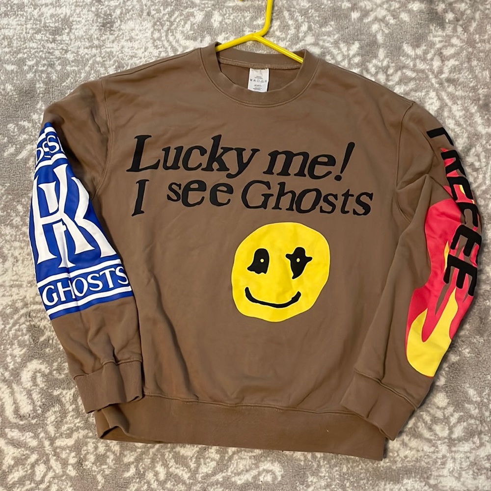 Women’s halloween sweatshirt.  Size L. Colors:brown, red, blue and yellow.